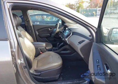 2011 Hyundai Tucson Limited z USA, uszkodzony, nr VIN KM8JUCAC1BU309762